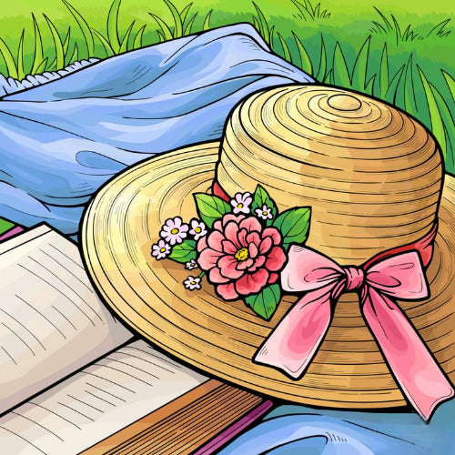 Straw hat with floral decorations and a pink bow on a book by a lake
