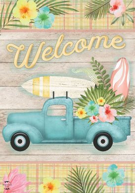 Vintage truck with surfboards on a wooden background with 'Welcome' text and tropical flowers.